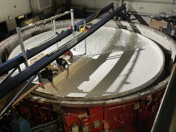 Loading glass into furnace for casting of GMT S7